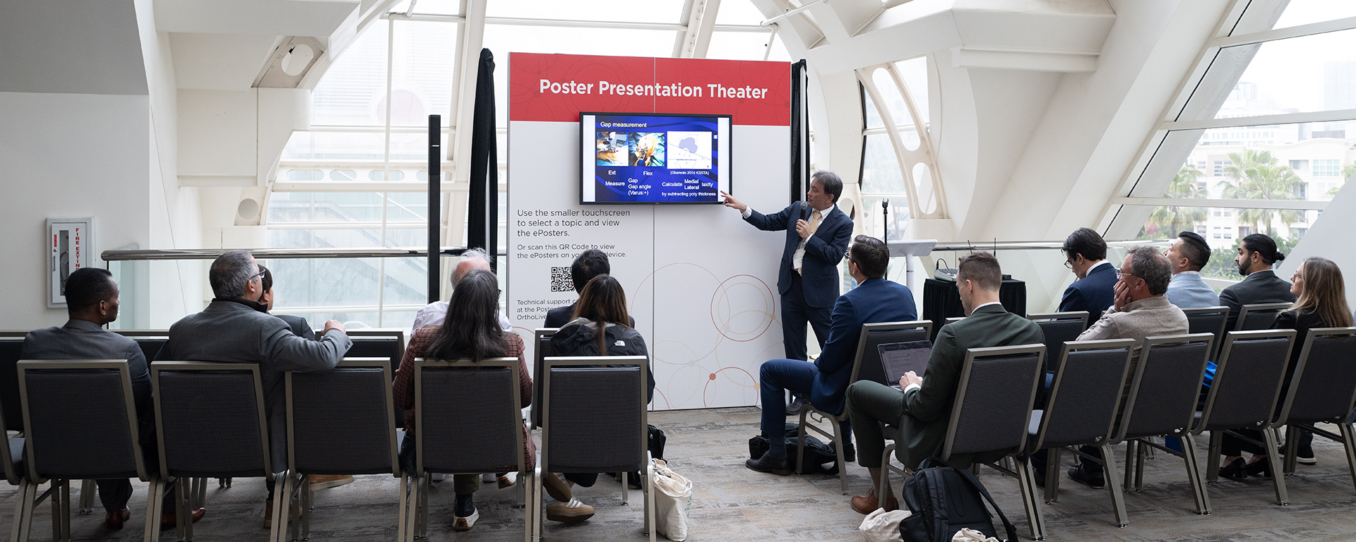 A person giving a presentation to a group of people.